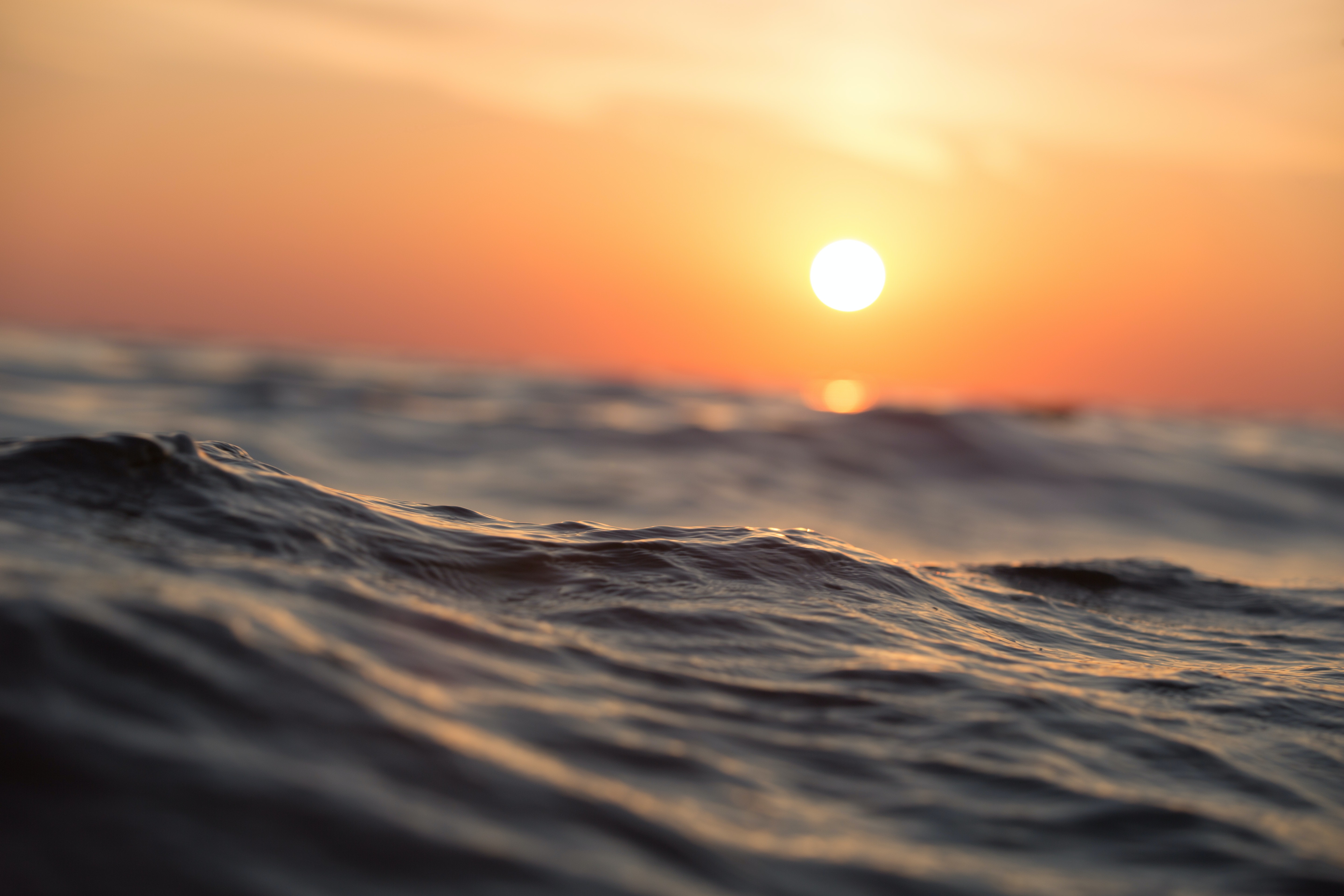 Sunset Over Waves